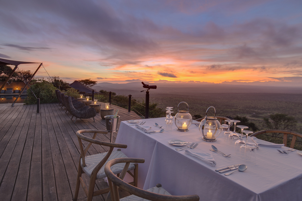 Why Sunsets and Sunrises Are Magical in Tanzania  Few natural phenomena rival the drama and beauty of an African sunrise or sunset. In Tanzania, the interplay of golden light, open plains, and iconic wildlife creates a sensory experience that lingers long after the sun dips below the horizon. These moments define the rhythm of a safari, marking the beginning and end of each day with awe-inspiring color, shadow, and silhouette.  Sunrises in the Serengeti or Tarangire herald the start of wildlife activity. Predators emerge from nocturnal rest, herbivores move across the plains, and birds begin their calls in forests and riverine areas. Sunsets, on the other hand, offer a time of reflection. The sky ignites in vibrant oranges, reds, and purples, while animals settle into their evening routines. For photographers, travelers, and romantics alike, these times offer unrivaled opportunities to connect with nature and capture its beauty.  The Best Spots to Witness Sunrises and Sunsets in Tanzania Serengeti National Park: Endless Plains in Golden Light  The Serengeti&rsquo;s vast plains provide a perfect canvas for sunrise and sunset photography. During early morning game drives, the low sun casts long shadows across rolling grasslands, highlighting wildebeest, zebra, and predators in stunning contrast.  Sunsets over the Serengeti are equally spectacular. The wide-open horizon allows uninterrupted views of the sun sinking behind acacia trees, often silhouetting giraffes or elephants in the foreground. Luxury lodges and mobile camps strategically positioned in the plains enhance the experience, offering private decks and early morning or late evening viewing options.  Ngorongoro Crater: Dramatic Rim Views  The Ngorongoro Crater provides some of the most dramatic sunrise and sunset vistas in Tanzania. From the crater rim, travelers can watch the sun illuminate the caldera floor below, revealing herds of wildlife in a soft, golden glow.  Early morning descents allow visitors to witness mist rising from the crater floor as animals stir. Evening light transforms the crater walls into fiery shades of red and orange, creating a perfect backdrop for photography or simply contemplative observation. Lodges along the rim often offer terraces and outdoor lounges specifically designed for enjoying these natural spectacles.  Tarangire National Park: Baobabs in Silhouette  Tarangire&rsquo;s iconic baobab trees and large elephant herds make sunsets here particularly memorable. As the sun dips, the massive trunks create striking silhouettes against a fiery sky, while elephants often move slowly toward water sources, adding motion and life to the scene.  Morning light also transforms the park, emphasizing textures in the savannah and revealing subtle wildlife behavior previously hidden in shadow. Walking safaris in early morning can offer intimate experiences with birds, primates, and smaller mammals, all bathed in soft, warm light.  Why Timing and Light Matter for Safari Photography  Sunrise and sunset are considered the &ldquo;golden hours&rdquo; in photography for good reason. The low angle of the sun produces warm tones, long shadows, and depth that highlight landscapes and wildlife in ways that midday light cannot.  For wildlife photographers, this is the optimal time to capture dramatic shots of predators in action or to frame elephants and giraffes against vibrant skies. For travelers, it is a time to pause, reflect, and fully immerse in the sensory richness of the safari. The combination of lighting, wildlife, and natural scenery produces moments that are both visually stunning and emotionally resonant.  Tips for Enjoying Sunsets and Sunrises on Safari  Plan Early Morning Drives: Wake before dawn to witness animals at their most active while capturing soft morning light.  Reserve Sunset Locations: Many lodges have terraces or private viewing points specifically for sunsets. Plan to arrive early to secure the best position.  Bring Proper Gear: Cameras with zoom lenses and tripods help capture distant wildlife and expansive landscapes. Binoculars enhance birdwatching and detail observation.  Dress in Layers: Early mornings and late evenings can be chilly, even in Tanzania&rsquo;s tropics. Lightweight layers keep you comfortable.  Pause and Reflect: Sometimes the most rewarding moments aren&rsquo;t photographed. Simply soaking in the scene&mdash;watching elephants walk past in the golden light&mdash;creates lasting memories.  Conclusion: The Soul of Tanzania in Light  Sunrises and sunsets in Tanzania are more than just beautiful moments&mdash;they are essential to the safari experience. They set the rhythm of the day, shape wildlife activity, and provide unforgettable visual and emotional experiences. From the sweeping Serengeti plains to the dramatic Ngorongoro rim and the iconic baobabs of Tarangire, Tanzania&rsquo;s skies elevate every safari with color, light, and a sense of wonder.  For travelers, photographers, and honeymooners alike, aligning safari activities with sunrise and sunset ensures that each day is experienced at its fullest, leaving an impression that lasts long after the journey ends.