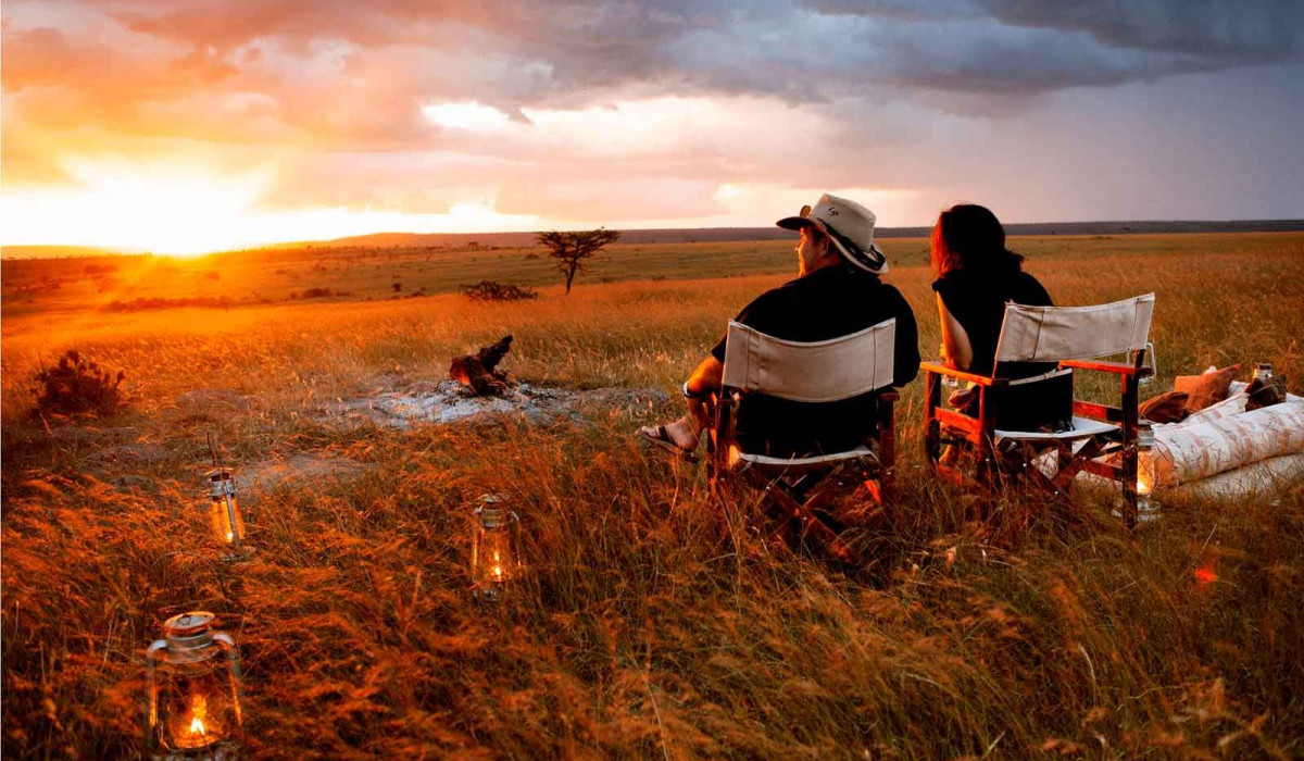 Why Sunsets and Sunrises Are Magical in Tanzania  Few natural phenomena rival the drama and beauty of an African sunrise or sunset. In Tanzania, the interplay of golden light, open plains, and iconic wildlife creates a sensory experience that lingers long after the sun dips below the horizon. These moments define the rhythm of a safari, marking the beginning and end of each day with awe-inspiring color, shadow, and silhouette.  Sunrises in the Serengeti or Tarangire herald the start of wildlife activity. Predators emerge from nocturnal rest, herbivores move across the plains, and birds begin their calls in forests and riverine areas. Sunsets, on the other hand, offer a time of reflection. The sky ignites in vibrant oranges, reds, and purples, while animals settle into their evening routines. For photographers, travelers, and romantics alike, these times offer unrivaled opportunities to connect with nature and capture its beauty.  The Best Spots to Witness Sunrises and Sunsets in Tanzania Serengeti National Park: Endless Plains in Golden Light  The Serengeti&rsquo;s vast plains provide a perfect canvas for sunrise and sunset photography. During early morning game drives, the low sun casts long shadows across rolling grasslands, highlighting wildebeest, zebra, and predators in stunning contrast.  Sunsets over the Serengeti are equally spectacular. The wide-open horizon allows uninterrupted views of the sun sinking behind acacia trees, often silhouetting giraffes or elephants in the foreground. Luxury lodges and mobile camps strategically positioned in the plains enhance the experience, offering private decks and early morning or late evening viewing options.  Ngorongoro Crater: Dramatic Rim Views  The Ngorongoro Crater provides some of the most dramatic sunrise and sunset vistas in Tanzania. From the crater rim, travelers can watch the sun illuminate the caldera floor below, revealing herds of wildlife in a soft, golden glow.  Early morning descents allow visitors to witness mist rising from the crater floor as animals stir. Evening light transforms the crater walls into fiery shades of red and orange, creating a perfect backdrop for photography or simply contemplative observation. Lodges along the rim often offer terraces and outdoor lounges specifically designed for enjoying these natural spectacles.  Tarangire National Park: Baobabs in Silhouette  Tarangire&rsquo;s iconic baobab trees and large elephant herds make sunsets here particularly memorable. As the sun dips, the massive trunks create striking silhouettes against a fiery sky, while elephants often move slowly toward water sources, adding motion and life to the scene.  Morning light also transforms the park, emphasizing textures in the savannah and revealing subtle wildlife behavior previously hidden in shadow. Walking safaris in early morning can offer intimate experiences with birds, primates, and smaller mammals, all bathed in soft, warm light.  Why Timing and Light Matter for Safari Photography  Sunrise and sunset are considered the &ldquo;golden hours&rdquo; in photography for good reason. The low angle of the sun produces warm tones, long shadows, and depth that highlight landscapes and wildlife in ways that midday light cannot.  For wildlife photographers, this is the optimal time to capture dramatic shots of predators in action or to frame elephants and giraffes against vibrant skies. For travelers, it is a time to pause, reflect, and fully immerse in the sensory richness of the safari. The combination of lighting, wildlife, and natural scenery produces moments that are both visually stunning and emotionally resonant.  Tips for Enjoying Sunsets and Sunrises on Safari  Plan Early Morning Drives: Wake before dawn to witness animals at their most active while capturing soft morning light.  Reserve Sunset Locations: Many lodges have terraces or private viewing points specifically for sunsets. Plan to arrive early to secure the best position.  Bring Proper Gear: Cameras with zoom lenses and tripods help capture distant wildlife and expansive landscapes. Binoculars enhance birdwatching and detail observation.  Dress in Layers: Early mornings and late evenings can be chilly, even in Tanzania&rsquo;s tropics. Lightweight layers keep you comfortable.  Pause and Reflect: Sometimes the most rewarding moments aren&rsquo;t photographed. Simply soaking in the scene&mdash;watching elephants walk past in the golden light&mdash;creates lasting memories.  Conclusion: The Soul of Tanzania in Light  Sunrises and sunsets in Tanzania are more than just beautiful moments&mdash;they are essential to the safari experience. They set the rhythm of the day, shape wildlife activity, and provide unforgettable visual and emotional experiences. From the sweeping Serengeti plains to the dramatic Ngorongoro rim and the iconic baobabs of Tarangire, Tanzania&rsquo;s skies elevate every safari with color, light, and a sense of wonder.  For travelers, photographers, and honeymooners alike, aligning safari activities with sunrise and sunset ensures that each day is experienced at its fullest, leaving an impression that lasts long after the journey ends.